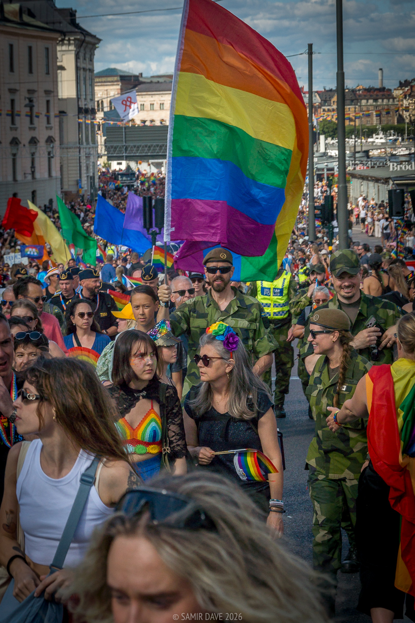 The Swedish military aka Försvarsmakten carrying flags to show their support at Stockholm Pride Festival 2026.