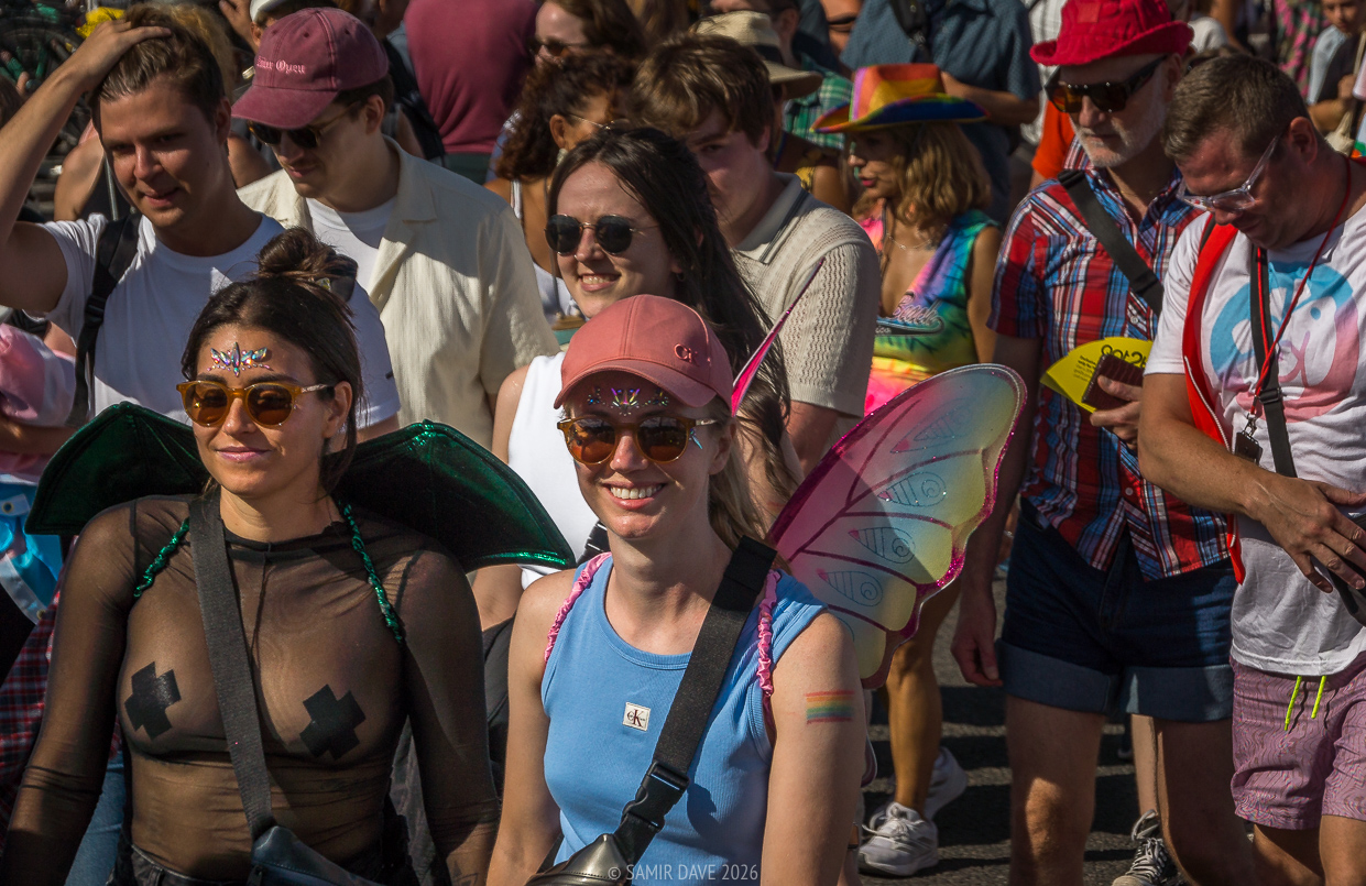 Smiling attendees at Stockholm Pride Festival 2026.